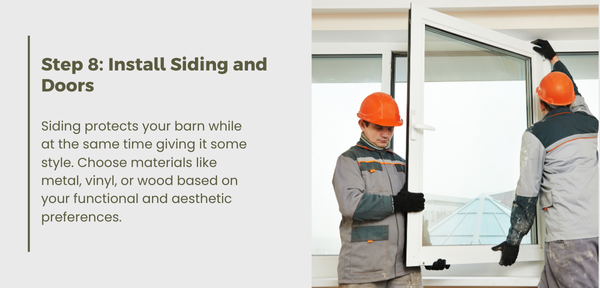 Two men in hard hats stand beside a window, discussing siding installation for a barn.